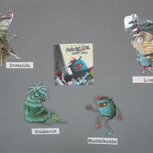 Bilder aus dem Buch "Muddelkuddel trennt Müll"